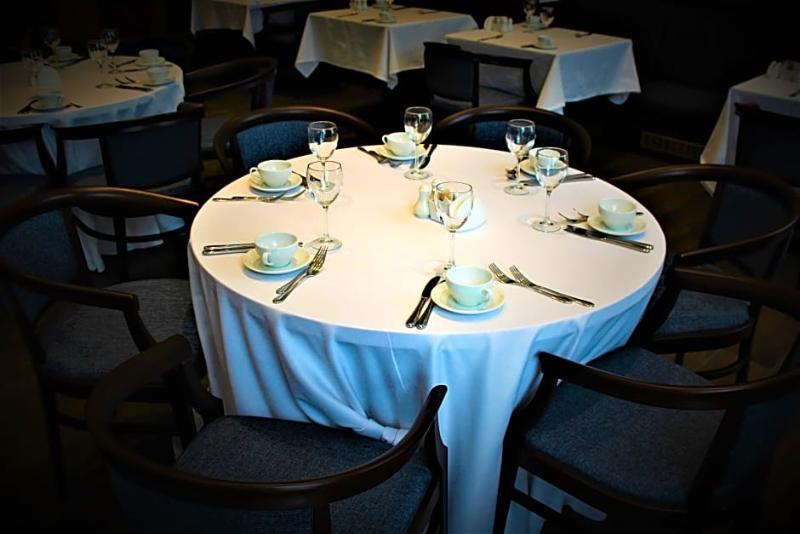 Rahat Palace Hotel Alma-Ata Exteriör bild A table set for a meal
